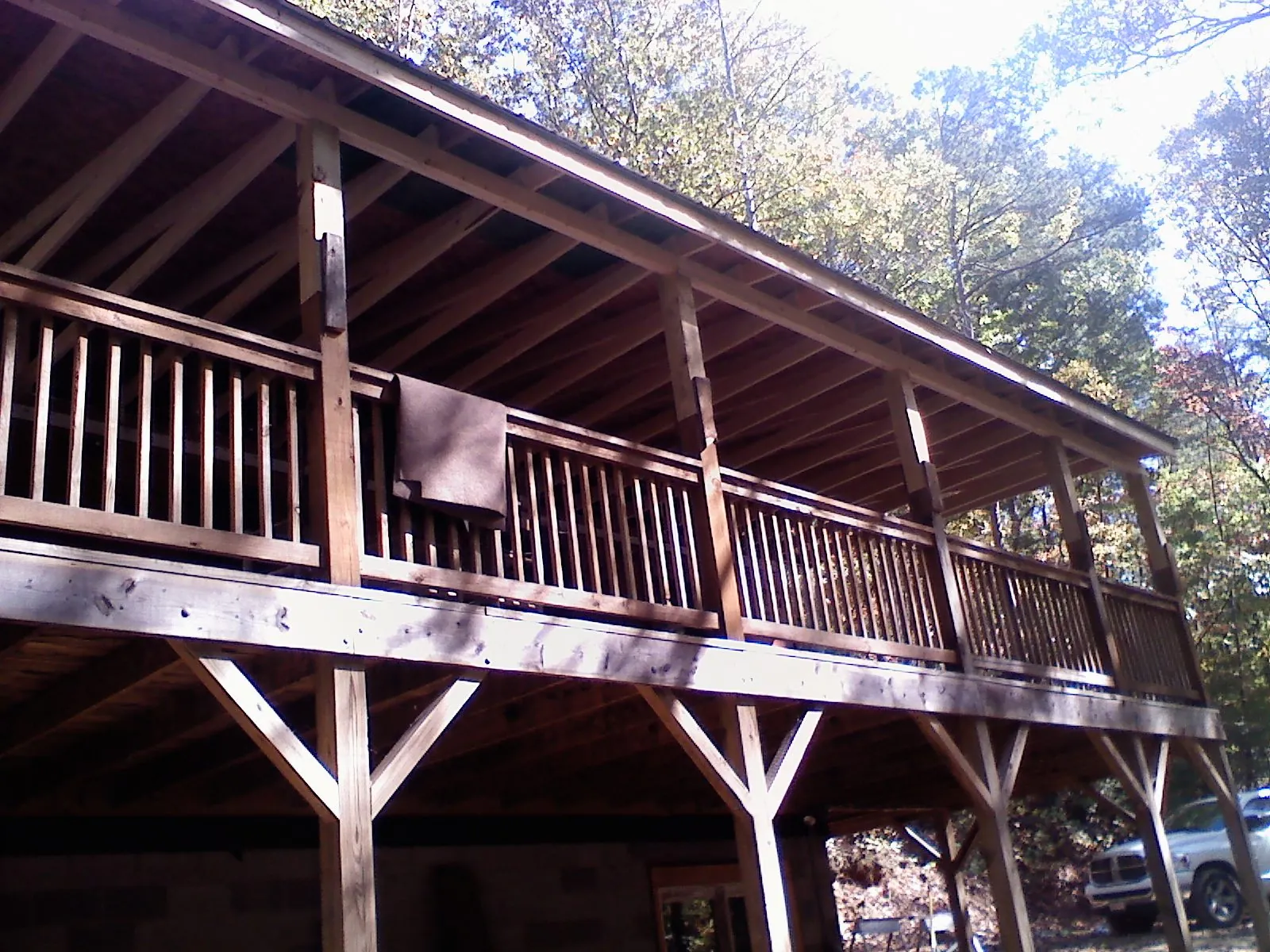 Timber framing under a new elevated porch and deck — Roof Leak Repair in Footville by Roofing Brothers